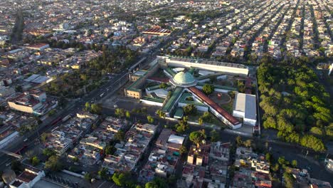 orbital drone shot of famous lecumberri prison and park in mexico city