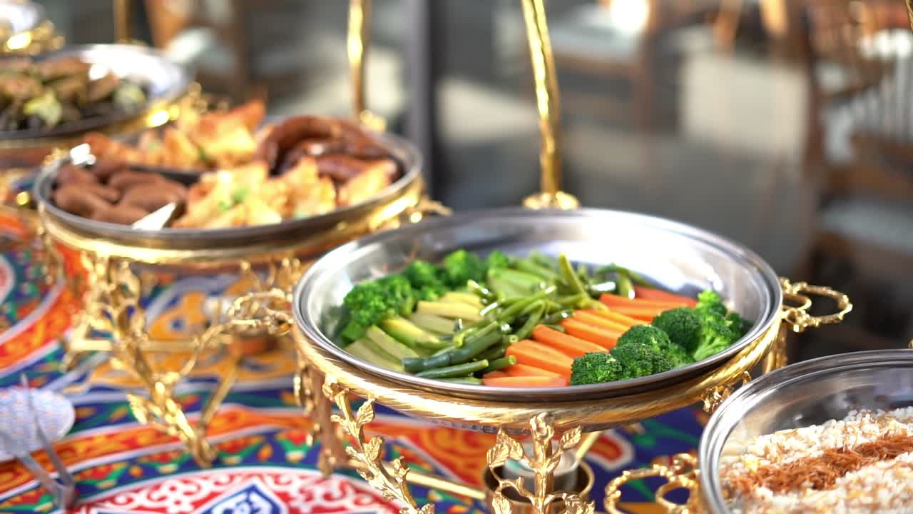 View of food in open buffet, close up shot, high angle shot