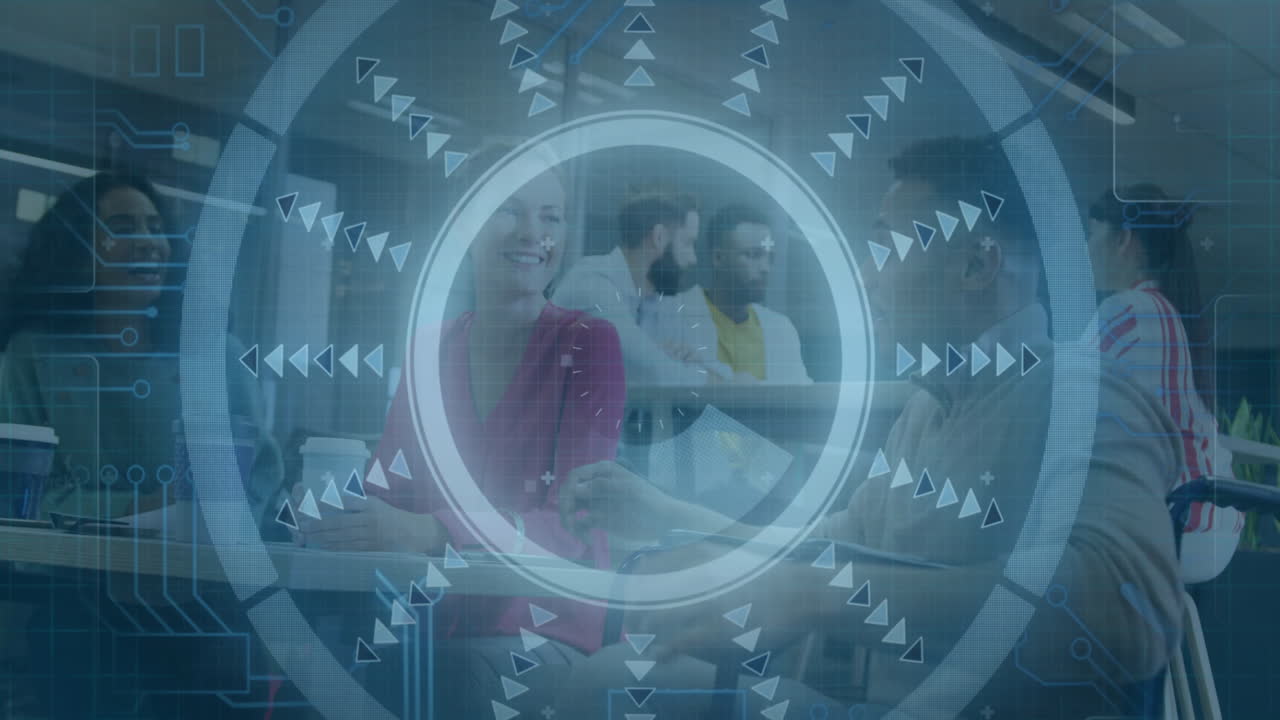 Team collaborating in tech office holding coffee cup and using smartphones around digital interface