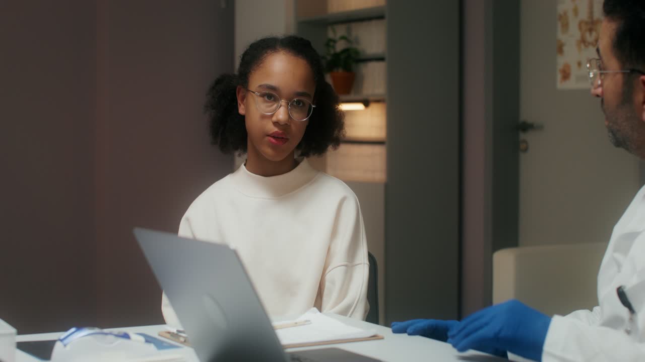Teenager Discussing Health Concerns With Doctor