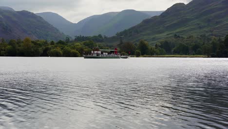 Background-shot-of-an-Ullswater-Steamer-ship-glides-through-the-tranquil-waters-of-Ullswater-lake-in-the-UK-Lake-District