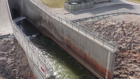 Aerial-close-up-dolly-shot-of-the-Wakarusa-River-spillway-at-the-Clinton-Lake-Dam-in-Kansas