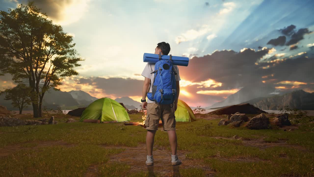 Man Camping at Sunset