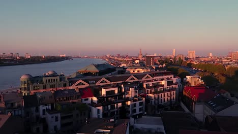 panoramic view of the city of antwerp, belgium from a tall building with the scheldt river and the city center