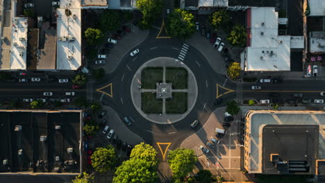 Aerial time lapse looking down at roundabout in Franklin, Tennessee at sunset