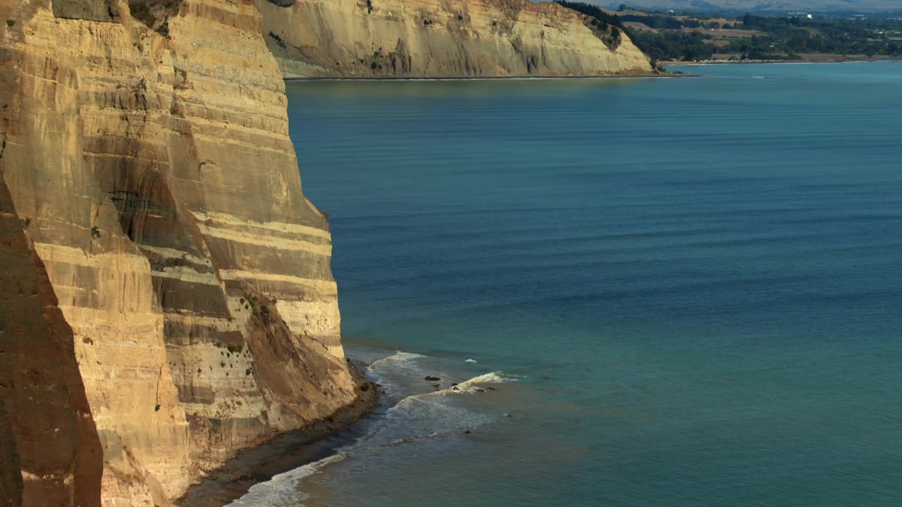 Steep Layered Cliffs Of Cape Kidnappers In Hawke's Bay, New Zealand. Static Shot