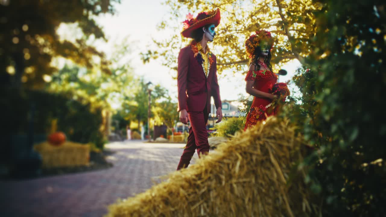 Dia de los Muertos Couple and Autumn Decorations