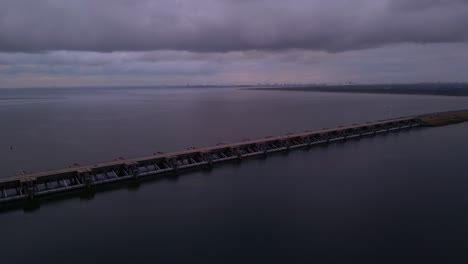 Vehicles-passing-on-multilane-road-on-Haringvliet-sluices-and-vast-water-surface