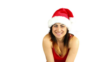 Festive-brunette-blowing-over-hands