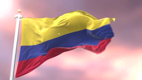 colombia flag waving at wind in slow at sunset, loop