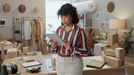 Fashion,-designer-and-face-of-woman-on-tablet