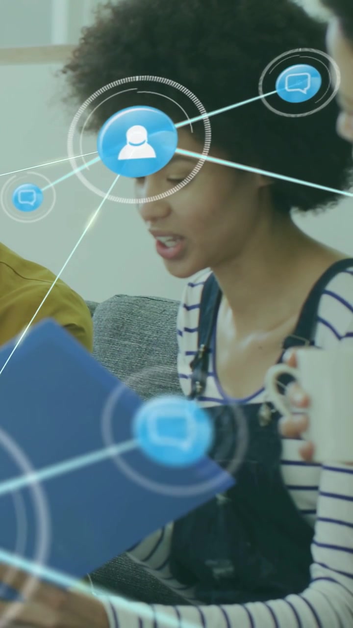 Business woman moving blue folder, spawning chat nodes linking as peer leaning in reviewing folder