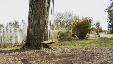 Empty,-creepy-rope-swing-swinging-in-slow-motion