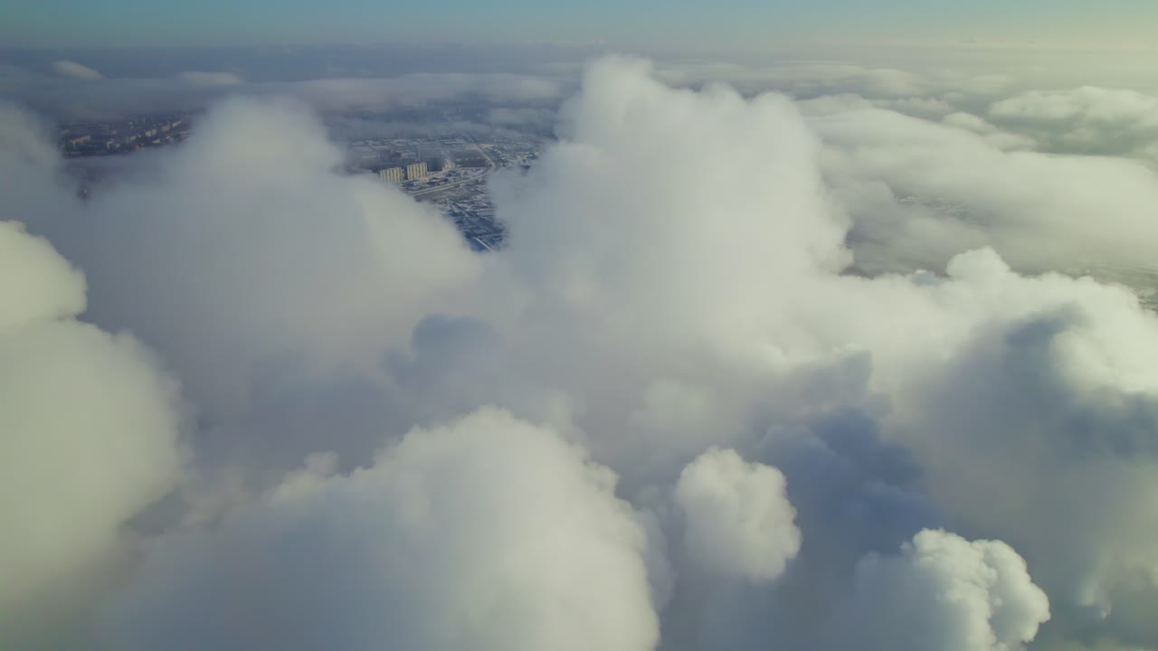City Hidden in Clouds - Aerial Winter View