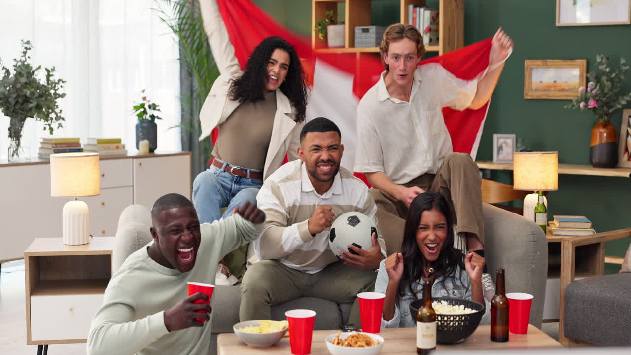A group of friends celebrating a soccer game at home