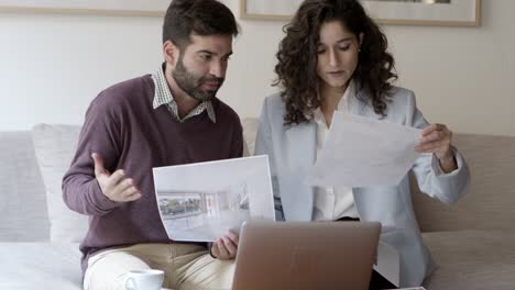 Confident-young-people-showing-interior-example-during-video-call