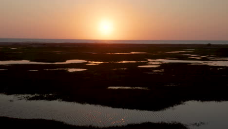 Angola,-Sonnenuntergang-über-Dem-Ozean,-Drohnenaufnahmen-4k