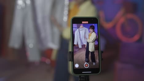 child fashion influencer recording video