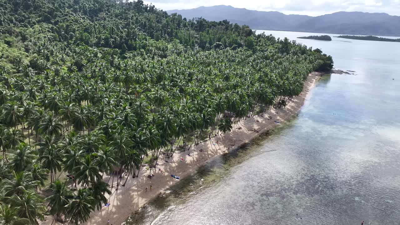 Tranquil aerial view of Coconut Beach in Palawan, tropical tourist destination. Philippines