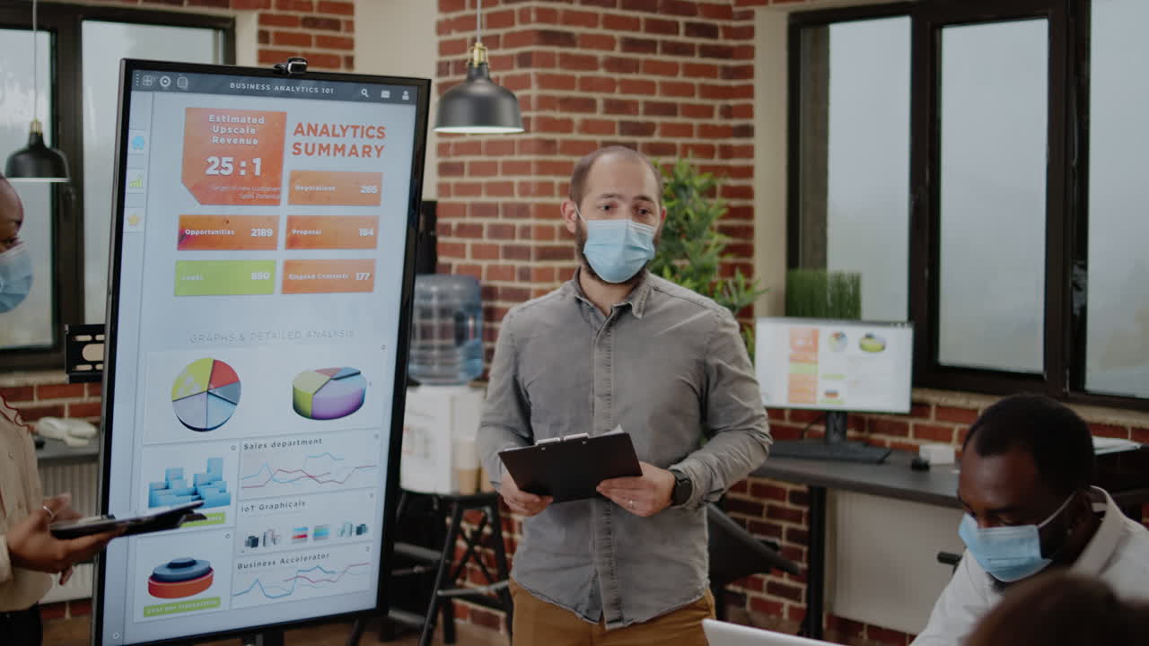 Team of multi ethnic workmates doing presentation in office