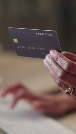 woman holding a credit card