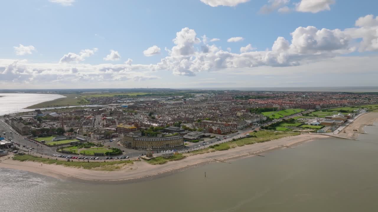Fleetwood Town Headland With Camera Pull Back, Rotate And Rise Revealing Whole Town. Lancashire, UK
