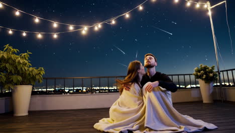 couple enjoying a romantic night on the rooftop