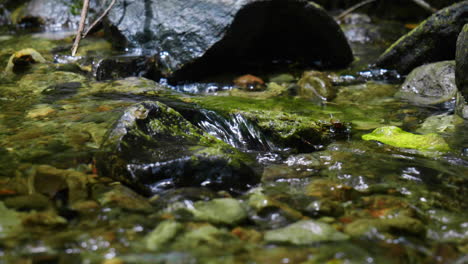 Close-up-of-rock-with-steam-flowing-around-it