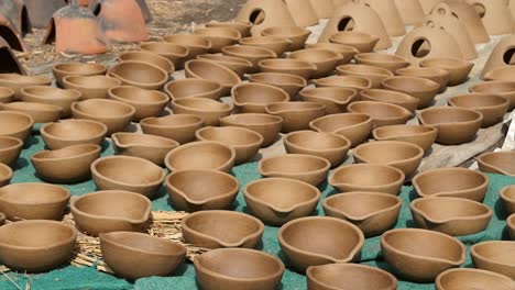 clay pots drying in the sun