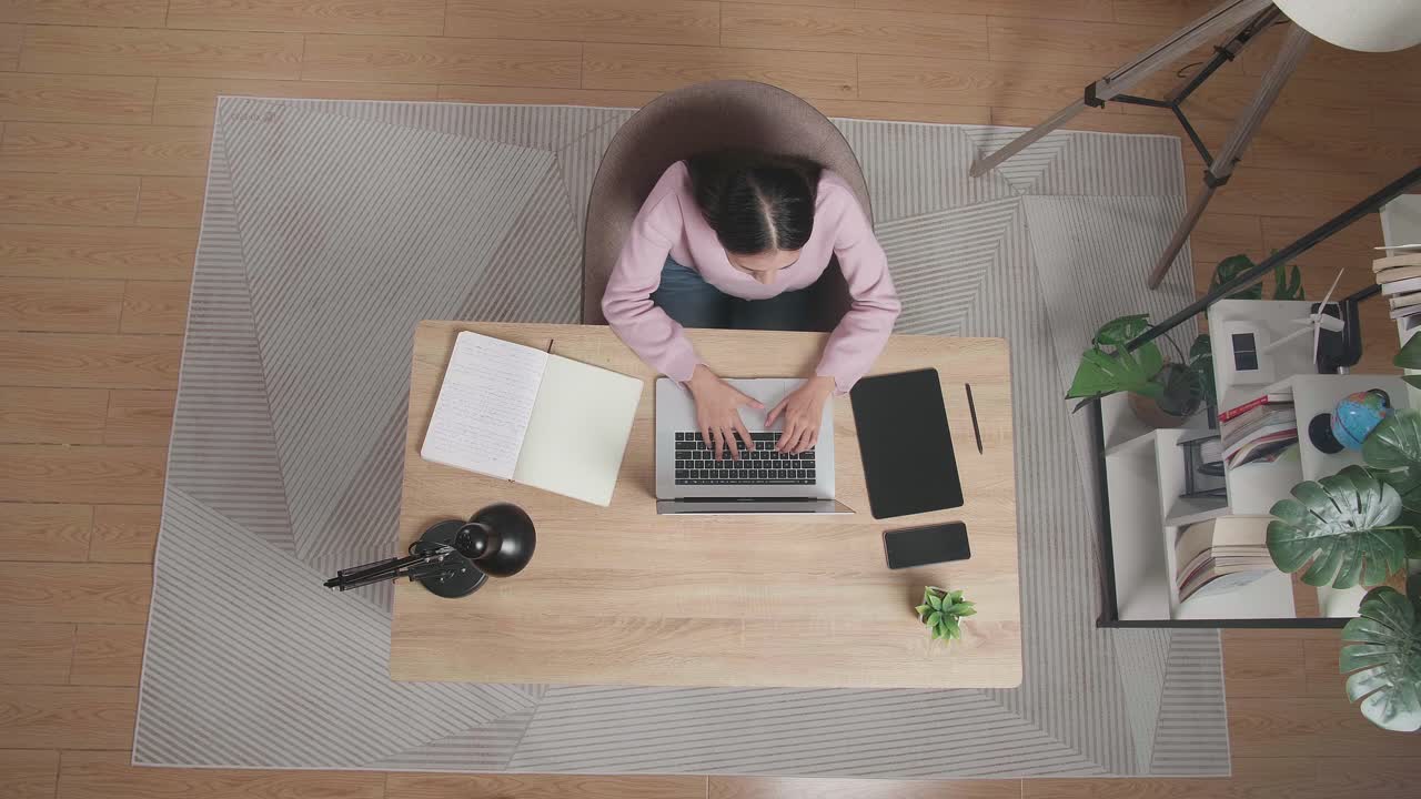 Woman working from home on laptop