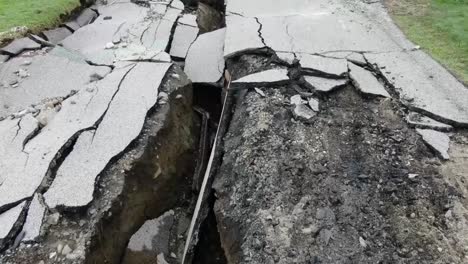 crushed broken road from earthquake drone