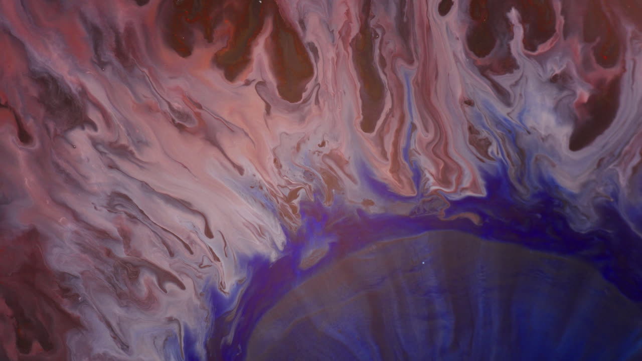 Close-up Of Liquid Colors In Shades Of Red, Purple, White, And Blue, Creating A Chaotic, Streaked Pattern Background