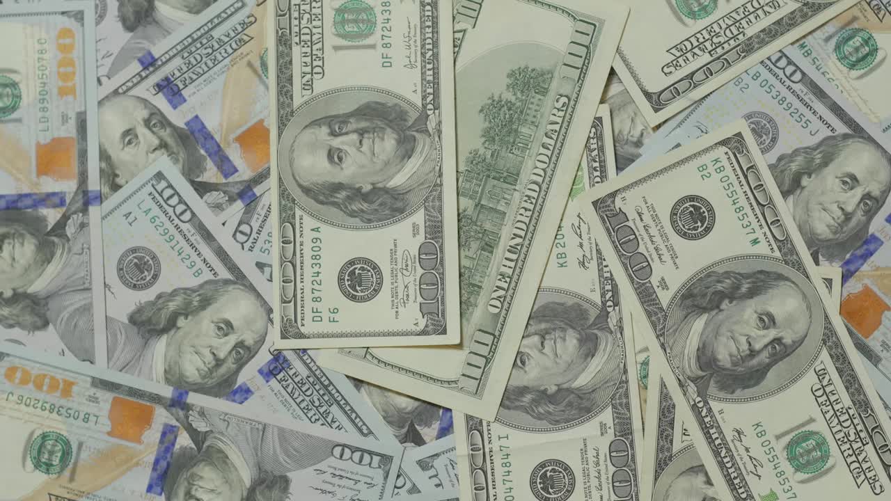 Stack Of 100 Dollars