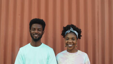 portrait of happy african american  man and woman outdoors