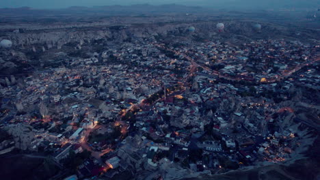 Cappadocia-at-dawn-with-first-lights-and-hot-air-balloons'-flames-and-fires