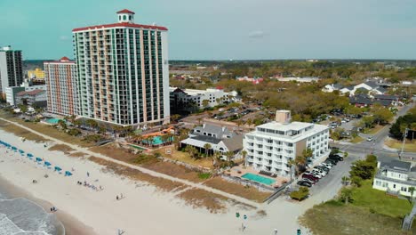 Steady-areal-shoot-of-coastline-and-residential-area-at-Myrtle-Beach,-South-Carolina,-USA