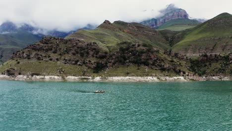 remote lake with people in boat