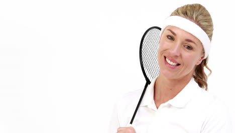 Smiling-badminton-player-holding-racket