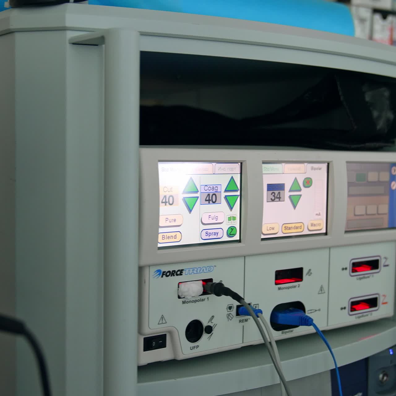 Complicated technological equipment working in modern surgery room. Interfaces of machines with diverse parameters during surgery