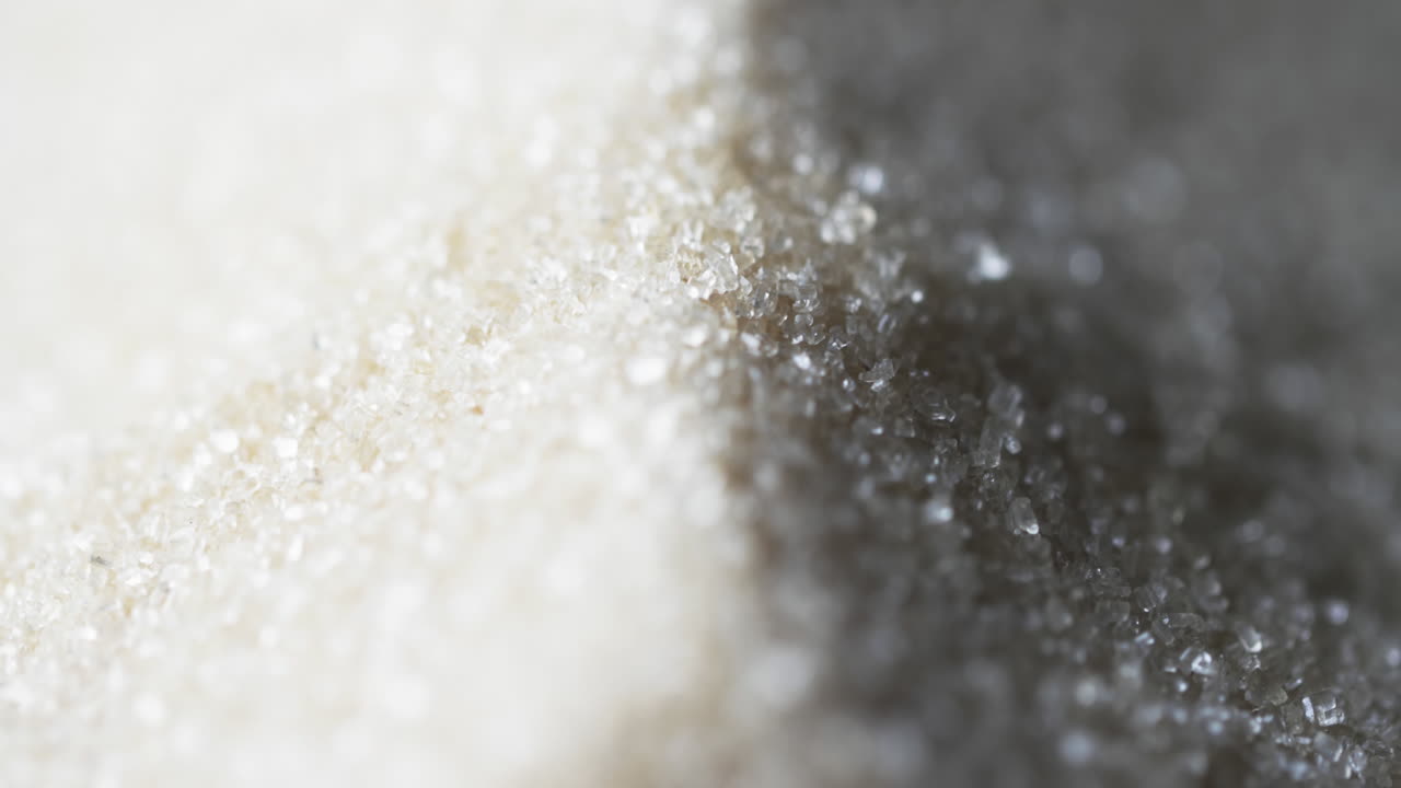 vídeo de primer plano de los granos de arena y copia del fondo del espacio