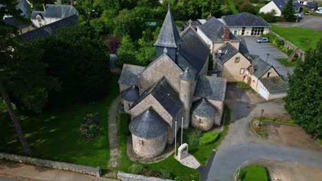 saint-sulpice church, neighborhood grenoux, laval in france. aerial drone top-down forward