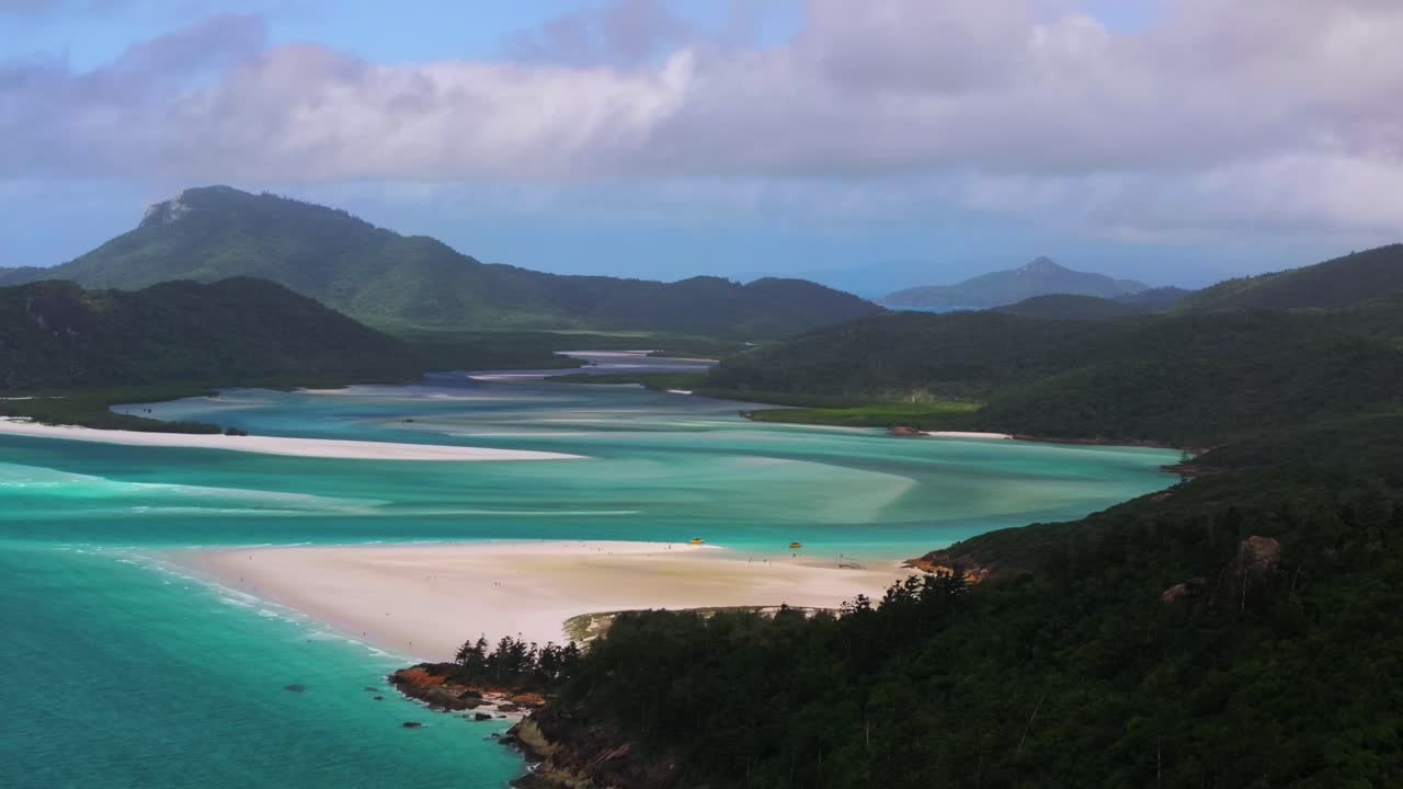 Hill Inlet Lookout aerial drone Picturesque view Whitsundays Islands Whitehaven Beach North end cloudy sunny summer spring autumn scenic flight touristy clear blue waters sandy National Park downward