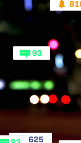 animation of social media icons and numbers over out of focus city and traffic lights