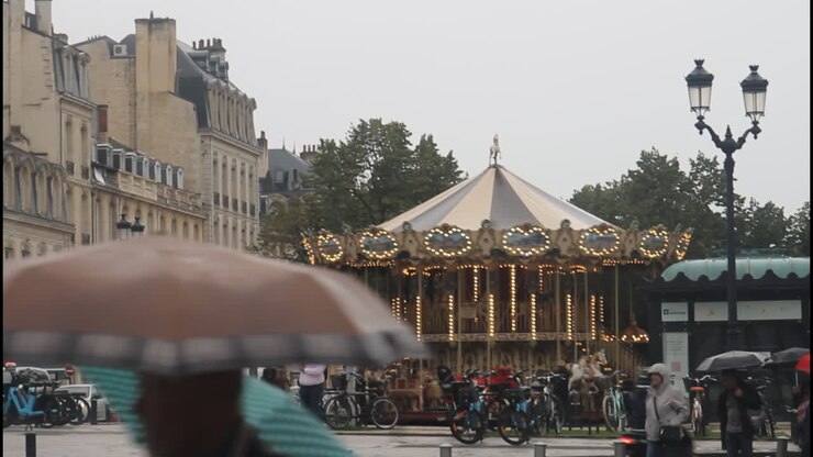 City street with carousel and people