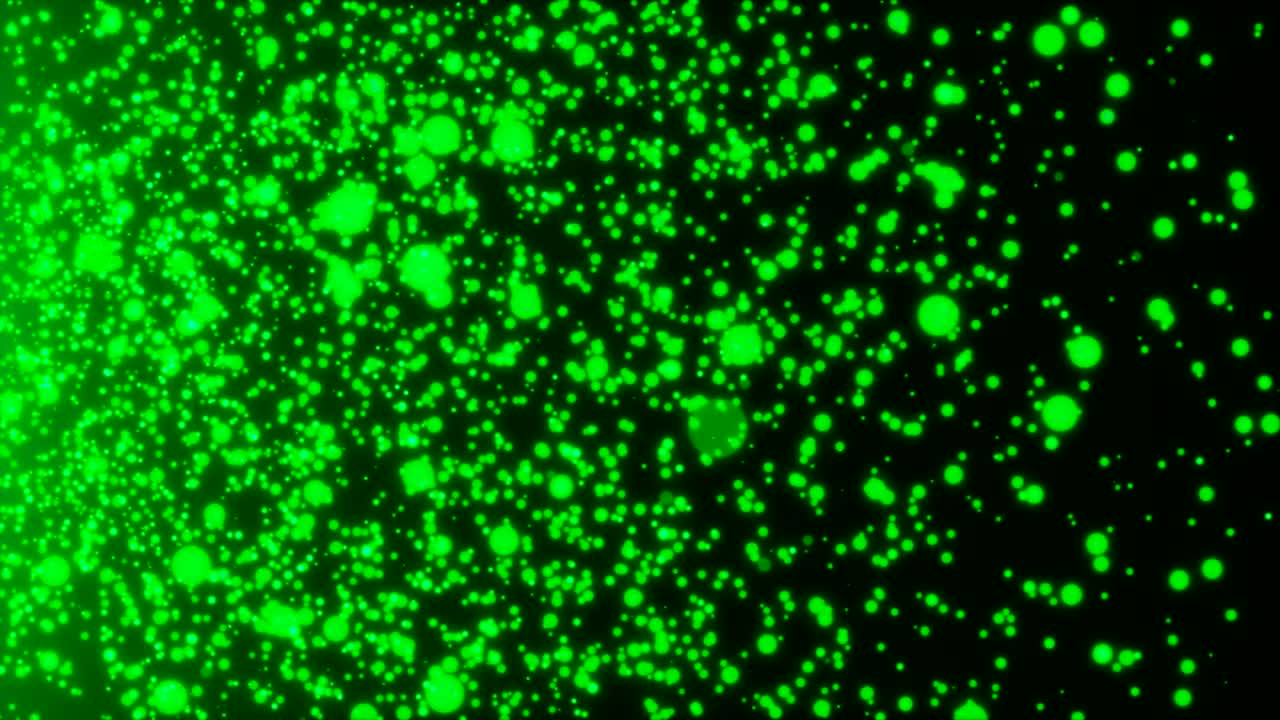 Many abstract small green particles in space, computer generated abstract background
