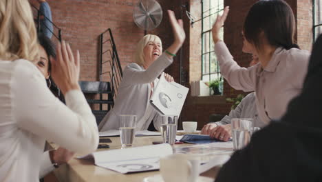 steadicam shot in of diverse business team meeting