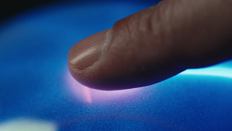 finger on fingerprint scanner