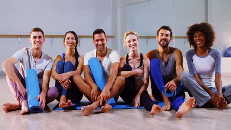 Group-of-people-sitting-on-floor