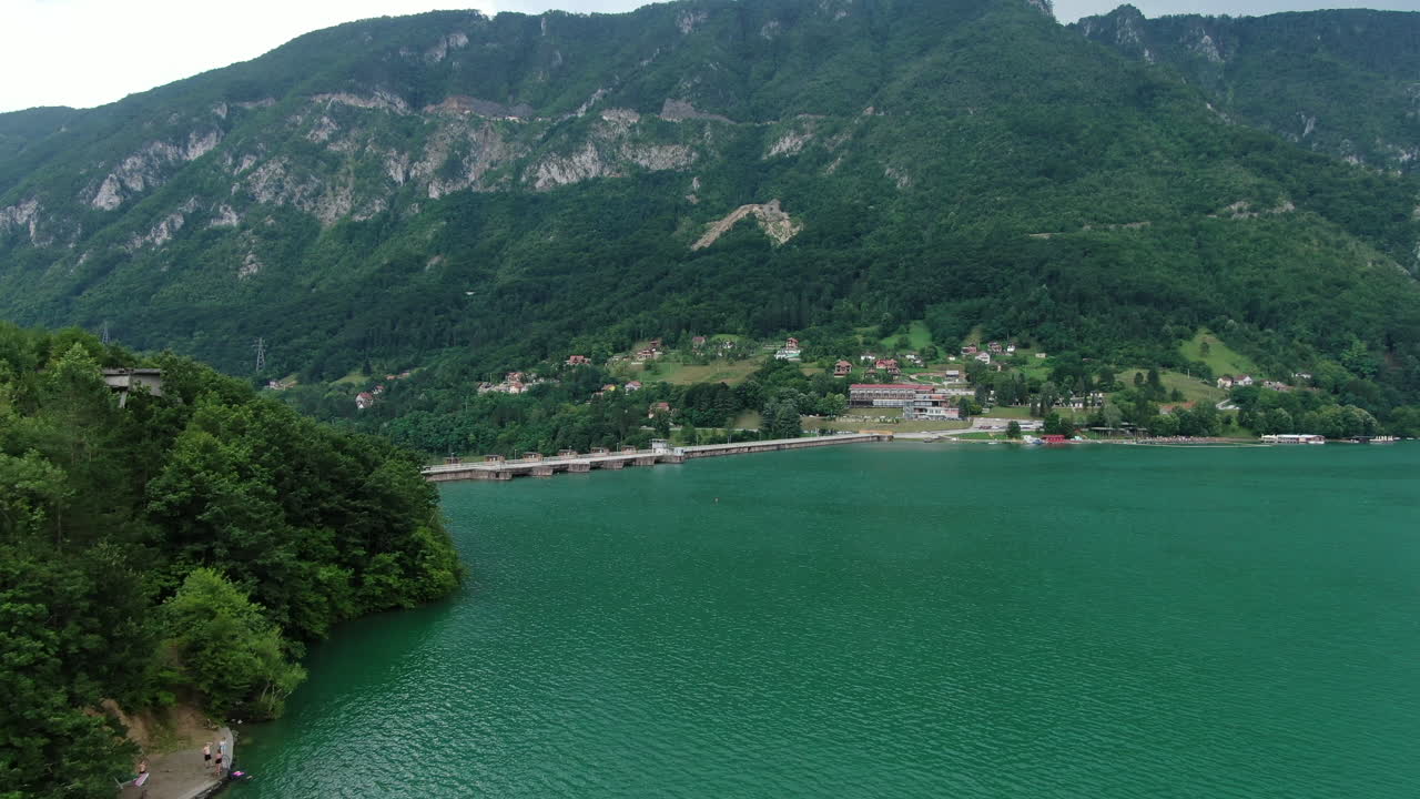 Aerial view of the lake with the dam