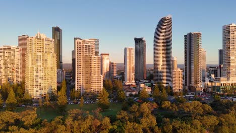 Aerial view of Gold Coast skyscrapers at sunrise, highlighting modern architecture and vibrant morning light